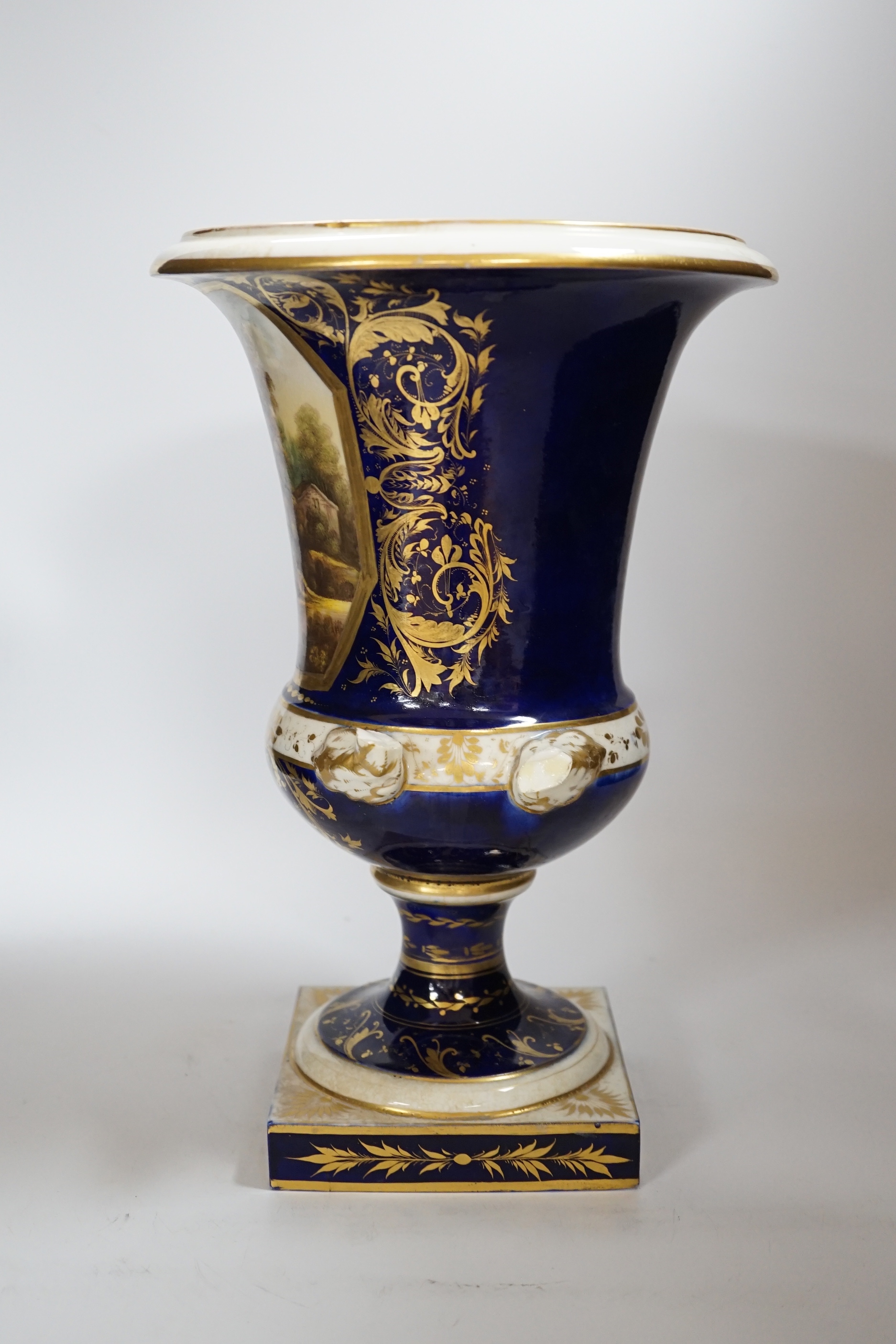 A large Crown Derby campana shaped urn, painted with a view on the river Derwent, circa 1815-20, 33cm
